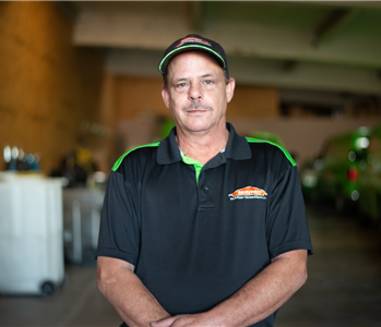 Image of SERVPRO of North Shasta's employee in front of black background.