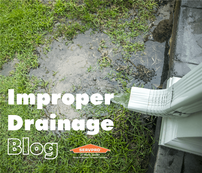 Flooded yard with Improper Drainage text
