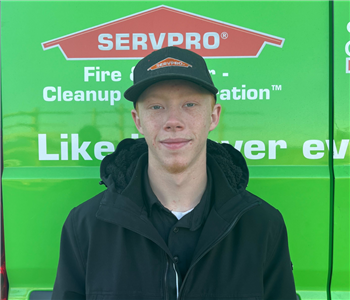 Image of SERVPRO of North Shasta's employee in front of green background. 
